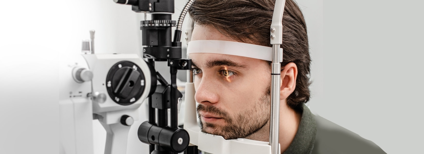 young man during eye exam in Greater Lowell